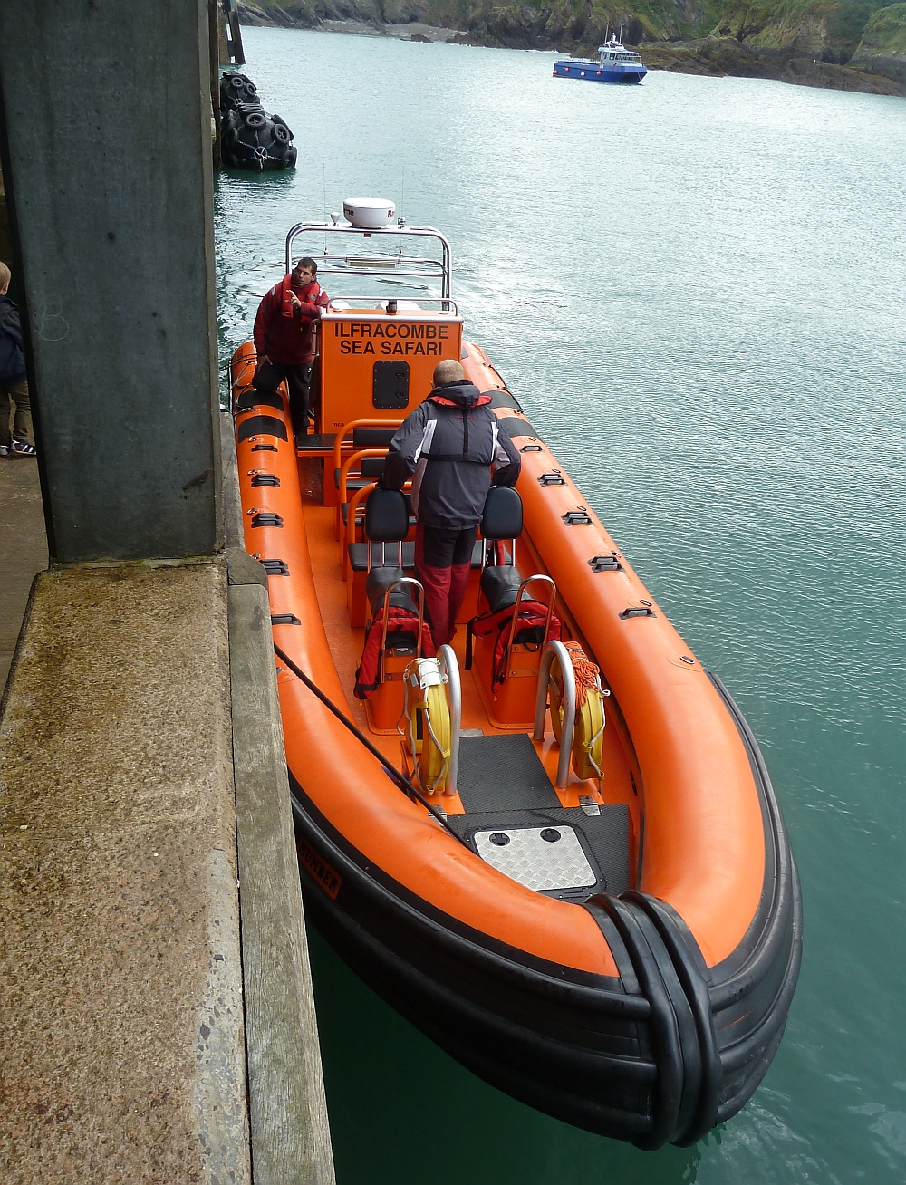 A rigid inflatable boat running at speed
