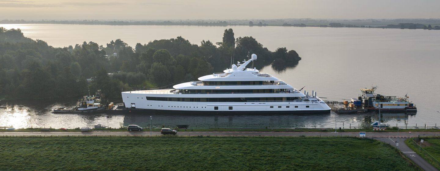 Love under tow with tugs during her transit through the Dutch waterways