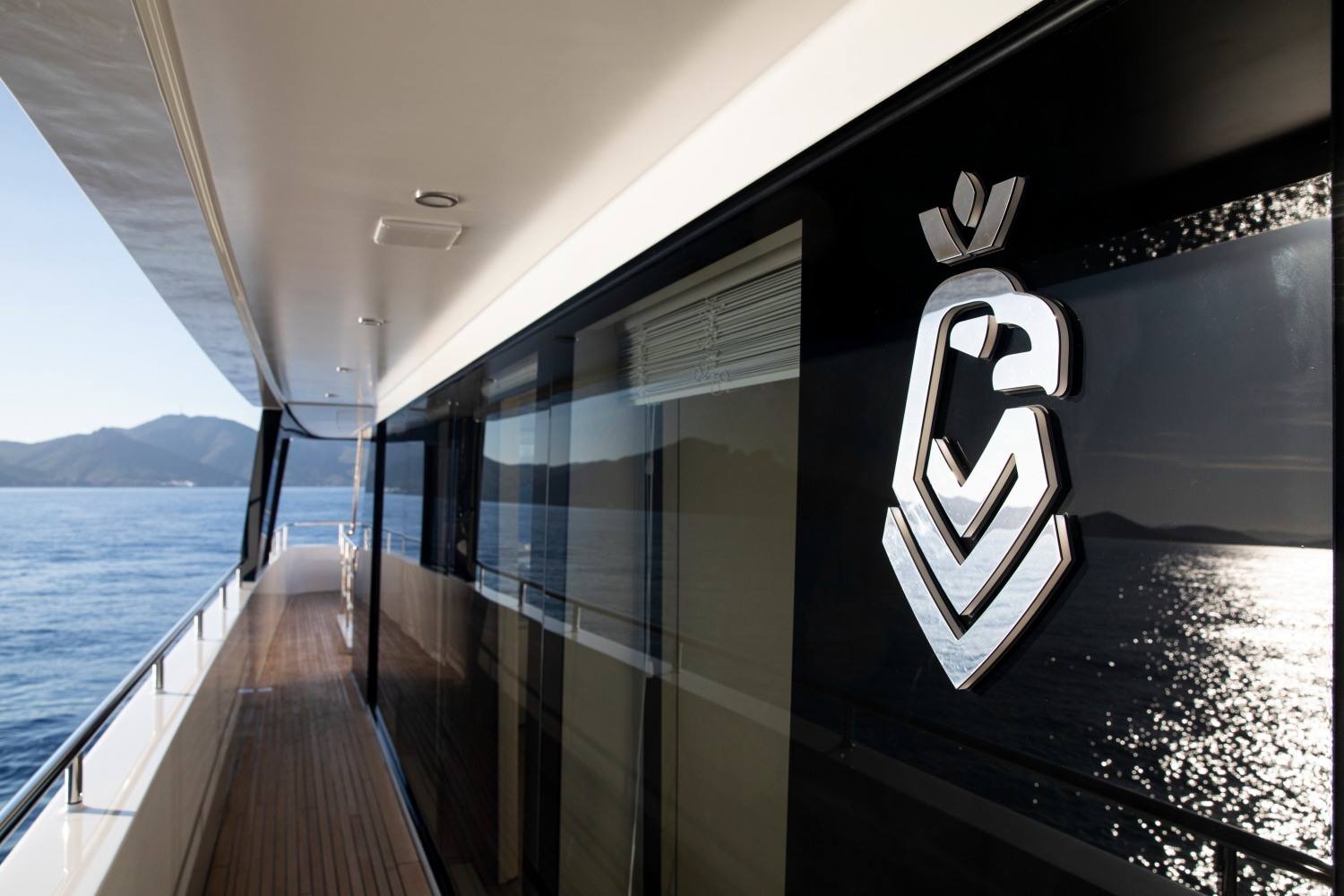 Side deck and Van der Valk emblem aboard the motor yacht VENERA