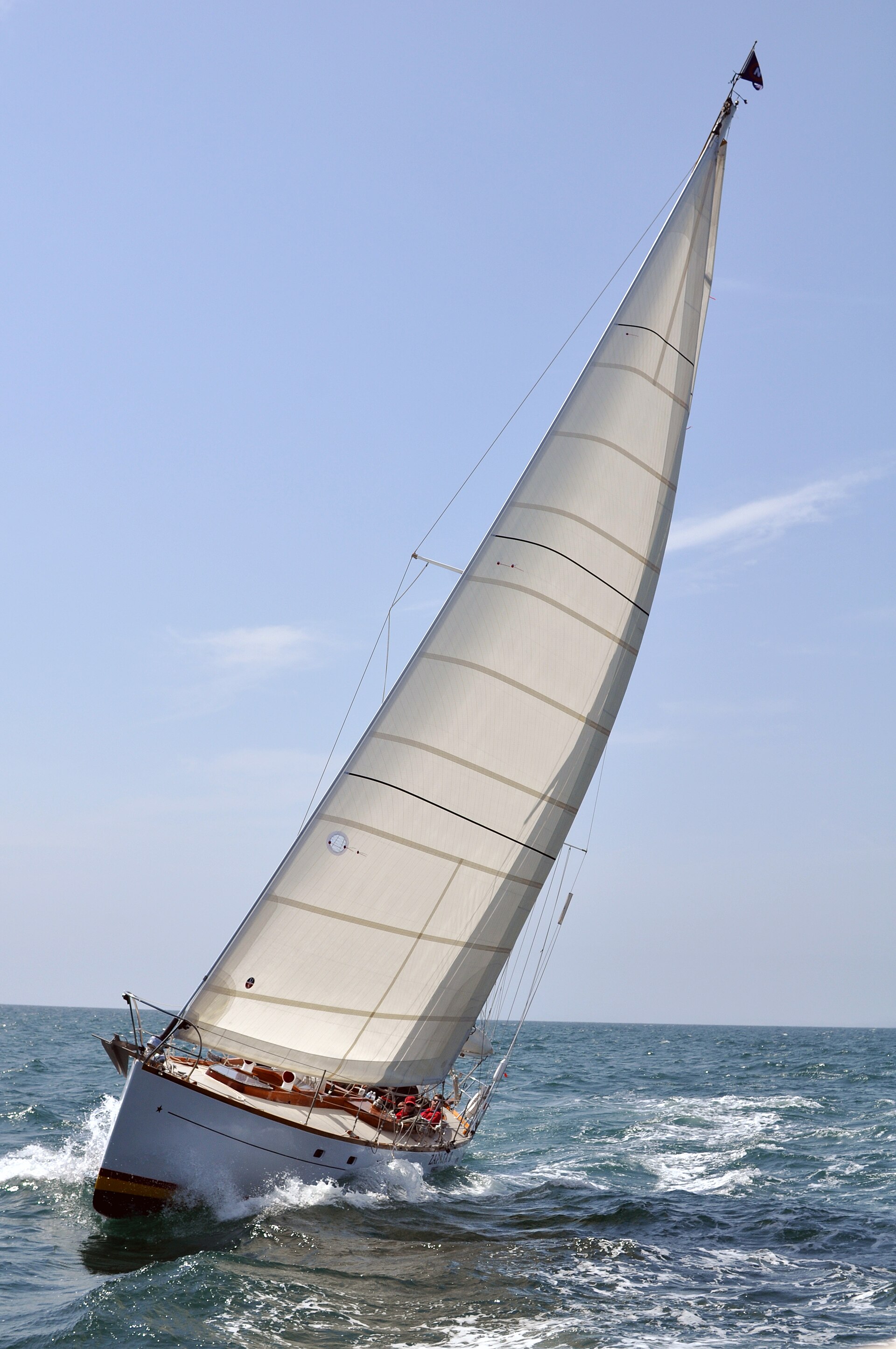 A classic yacht racing under sail