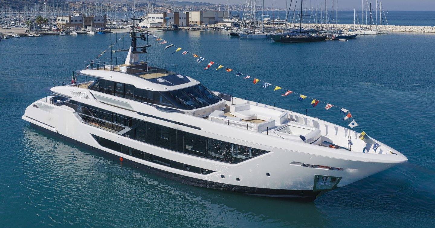 The first Custom Line Saetta 128 dressed overall in Ancona harbour after launch