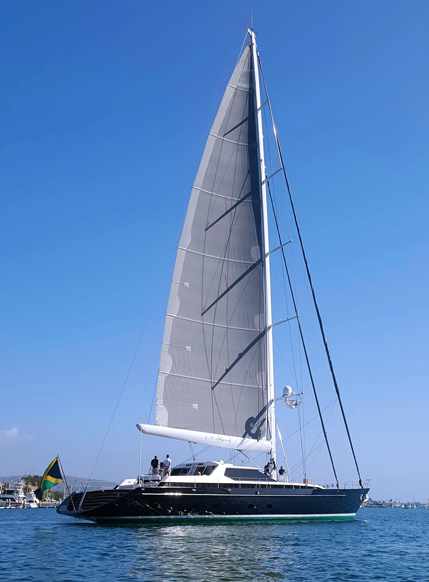 A large sailing yacht under full sail